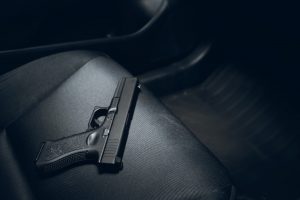 How Do You Legally Carry Firearms in a Car?